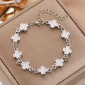 Silver stainless steel bracelet featuring white enamel cross links and adjustable lobster clasp - Silver White Cross Link Bracelet (8688)