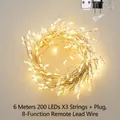 Warm yellow 6m 200 LED string lights with 8-mode remote control for Christmas decor - 18m 600LED Plug-in Set / Silver Wire Warm White