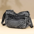 Washed grey denim crossbody bag with multi-zipper pockets and adjustable strap - Black