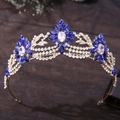 Detailed view of floral bridal crown with blue rhinestones and gold-plated zinc alloy finish - KC Gold Blue Zircon