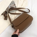 Minimalist brown leather crossbody bag for women with gold hardware and flap closure - Coffee