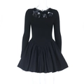 Detail of elegant black long sleeve dress featuring square neck and pleated full skirt - S / Black
