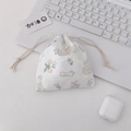 Cute cream canvas drawstring pouch with hand-drawn rabbit and flower pattern - Rabbit Paradise