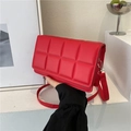 Red padded woven crossbody cassette bag with adjustable strap and premium leather texture - Red