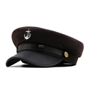 Detail of nautical wool newsboy hat with anchor badge and leather brim detail - M (56-58cm) / Coffee