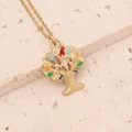Detail of golden tree of life pendant with colorful stones on a textured stone surface - Colorful Tree of Life Style (2#)