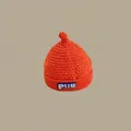 Bright orange children's knit beanie with blue letter patch and pointed top design - Orange-colored Pacifier With Leather Label (for Children Aged 2 Months To 2 Years)
