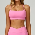 Pink athletic two-piece set with a criss-cross sports bra and high-waisted V-cut gym leggings - Rose Pink