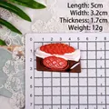Miniature resin steak fridge magnet model with steak and knife details on wood base - Style B
