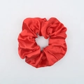 Elegant red satin scrunchie with a glossy silk finish for women's hair styling - Red