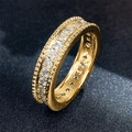 Close-up of gold eternity ring with white round-cut zircons and milgrain edge details - US 7 / Style T0515/Milgrain Edge / Gold