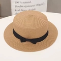 Boater straw hat in natural beige with black ribbon bow and wide brim for sun protection - Flat Top Boater Hat with Bow - Khaki