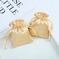 Elegant champagne gold satin drawstring pouch for jewelry and gift packaging - 7x9cm / Gold