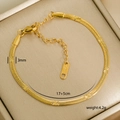 Detailed macro view of 3mm gold stainless steel snake chain with star engravings and clasp - 6-6 (3mm Engraved Snake Chain)