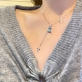 Silver bow necklace with rectangular teal gemstone and cross tassel pendant - Silver Cross Tassel Gemstone Necklace (XL1889)