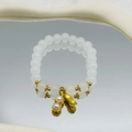 Elegant beaded bracelet with white pearls and gold peanut pendant on a mirror surface - S063-natural White Agate Peanut Bracelet #sz515