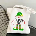 White canvas tote bag with Nurse Elf Christmas print on a metal chair - Style C1 (No Inner Pocket/No Zipper)