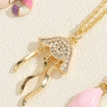 Gold jellyfish pendant necklace with sparkling cubic zirconia and ocean theme design - Zircon Jellyfish