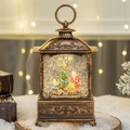 Vintage bronze Christmas lantern with Santa scene and swirling glitter snow effect - Santa Claus and Child
