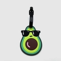 Detail of green avocado luggage tag made of soft PVC with a secure black leather strap - Avocado