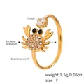 Anello a granchio dorato in acciaio inossidabile con zircone bianco e occhi neri - US 7 / Granchio Oro