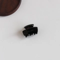 Glossy black acetate hair claw clip with interlocking teeth for daily hair styling - Solid Black