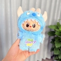 Blue plush monster doll with horns wearing a furry starry sky embroidered jumpsuit - Blue-haired Monster Set / First And Second Generation Keychains Are Compatible With La Cloth Dolls. Dolls Not Included.