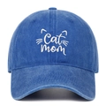 Close-up of Cat mom embroidery and premium washed denim texture on a baseball cap - One Size / Dark Blue