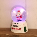 Sfera di cristallo luminosa con Babbo Natale e base innevata Merry Christmas - Babbo Natale in Piedi