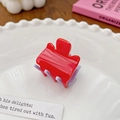 Mini hair claw clip in bright red and lavender purple made of glossy resin on a white plate - 3cm / Red & Purple