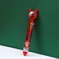 Detail of Christmas reindeer multi-color pen with red heart sequins in a glitter ball - Red Reindeer