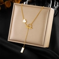 Gold stainless steel OT clasp necklace with heart and rectangle charms on a jewelry box - T-Bar White Heart Rectangle Pendant Style (N2741)