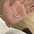 Handheld silver chain necklace featuring eight minimalist cylindrical beads for women - Eight Cylindrical Lucky Beads Pendant Necklace (XL1209)