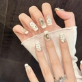 Uñas postizas doradas con purpurina, flores 3D y cristales cuadrados artesanales - Grande (L)