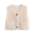 Detail of cream chunky knit vest featuring V-neckline and marbled buttons with pockets - Off White
