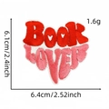 Detailed view of pink heart embroidered Book Lover patch with precise dimensions - Style 1 (Book Lover)