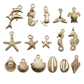 Set of 14 golden ocean alloy charms featuring dolphins, turtles and starfish - 16Pcs KC Gold Ocean Series