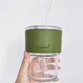 Bamboo-shaped glass coffee tumbler with olive green leather sleeve and glass straw - Tall Set with Green Leather Sleeve (Clear)