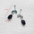 Macro view of alloy tulip pendant showing 31mm x 13mm dimensions for jewelry making - Black Tulip