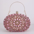 Detail of pink rhinestone evening bag with floral gemstone pattern and gold handle - Pink
