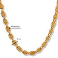 Vue macro du collier à nœuds doré avec une largeur de 7 mm et une longueur de 45 cm - Collier / 40cm+5cm / Doré