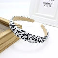 Retro black and white leopard print fabric headband with a stylish knot on a clean base - Black and White Leopard White Base (FK-B132 White)