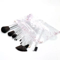 Macro shot of 12-piece makeup brushes with transparent glitter handles and pouch - 12Pcs With PVC Bag / Silver
