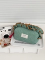 Borsa trapuntata vichy verde e bianca con volant arancione e nappina fucsia - Verde