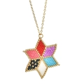 Detail view of handmade star pendant with colorful seed beads and thin gold chain - Colorful Star Style (XN179-2)