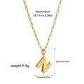 Detail view of gold letter N pendant with measurements and paperclip chain length - Letter N