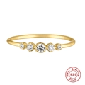 Close-up of golden S925 sterling silver V-shape ring with five sparkling opal gemstones - 5-Stone Bar Style-Size 6