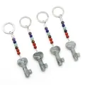 Chakra bead keychain set with heart-shaped stone key pendant on white background - Labradorite