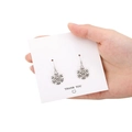 Silver snowflake drop earrings for women held on a decorative thank you card - 15mm Silver Snowflake