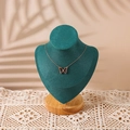 Rose gold butterfly pendant necklace on a dark teal velvet mannequin display stand - Small / Dark Green